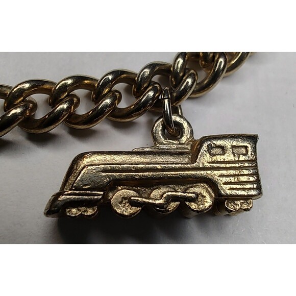 Vintage Gold Tone Charm Bracelet Airplane Cruise Ship Train Engine Florida Cross - Picture 8 of 13